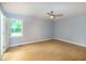 Bedroom with a window providing natural light and hardwood flooring at 2532 Rolling Meadows Dr, Raleigh, NC 27603