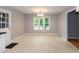 Open dining room with ample lighting, and connection to other rooms at 2532 Rolling Meadows Dr, Raleigh, NC 27603