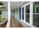 Charming front porch featuring classic white trim and a view of the surrounding landscape at 2532 Rolling Meadows Dr, Raleigh, NC 27603