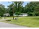 Charming single-story home with a well-manicured lawn and attached two-car garage at 2532 Rolling Meadows Dr, Raleigh, NC 27603