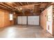 Unfinished two-car garage with two garage doors at 2532 Rolling Meadows Dr, Raleigh, NC 27603