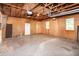 Unfinished two-car garage with two garage doors and a Personal door at 2532 Rolling Meadows Dr, Raleigh, NC 27603