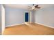 Spacious living room with hardwood floors and bright blue door at 2532 Rolling Meadows Dr, Raleigh, NC 27603