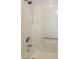 Shower and tub combination with chrome fixtures and a built in seat at 2532 Rolling Meadows Dr, Raleigh, NC 27603