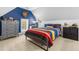 Bedroom featuring a sloped ceiling, comfortable bed, and light-filled window at 2538 Tuffeto, Apex, NC 27502