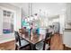The dining room features an open-concept with access to the kitchen, living room, and other rooms at 2538 Tuffeto, Apex, NC 27502