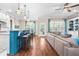 Bright living room featuring a bar, open layout, and seamlessly connected spaces ideal for entertaining at 2538 Tuffeto, Apex, NC 27502
