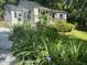 Charming home featuring a front yard with flowers and shrubs at 26 Rogerson Dr, Chapel Hill, NC 27517
