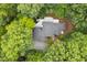 A serene aerial shot of a home nestled among lush trees, providing privacy at 2606 Sherbrooke Dr, Durham, NC 27712