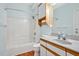 Bathroom featuring a bath and shower combination and vanity with a light blue wall at 2606 Sherbrooke Dr, Durham, NC 27712