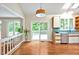 Open kitchen area with stainless steel appliances, plenty of counter space, and a sliding glass door at 2606 Sherbrooke Dr, Durham, NC 27712