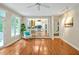 Inviting living room filled with natural light, hardwood floors and open view into the kitchen area at 2606 Sherbrooke Dr, Durham, NC 27712