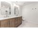 Stylish bathroom with a double sink vanity, modern fixtures, and a spacious layout at 2635 Asher View Ct, Raleigh, NC 27606