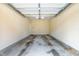 Spacious empty garage with concrete floors and ample room for parking and storage at 2635 Asher View Ct, Raleigh, NC 27606