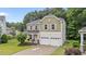 Charming two-story home with a two-car garage and beautifully landscaped front yard at 2709 Banks Lake Ct, Fuquay Varina, NC 27526