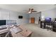 Office space with ample desk space, shelving, and lots of natural light, ceiling fan included at 2709 Banks Lake Ct, Fuquay Varina, NC 27526