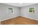 Spacious bedroom features hardwood floors, neutral walls, and a large window for natural light at 2752 Weldon Ter, Durham, NC 27703