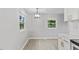 Bright kitchen featuring modern appliances, white cabinets and eat in kitchen area at 2752 Weldon Ter, Durham, NC 27703