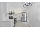 Modern kitchen with white cabinets, stainless steel appliances, and stylish countertops at 2752 Weldon Ter, Durham, NC 27703