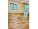 Basement with large sliding glass door and a window provide a view of the outdoors at 306 Fincastle Dr, Cary, NC 27513