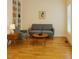 Cozy living room features wood floors, seating, and a built-in bookcase at 306 Fincastle Dr, Cary, NC 27513