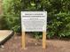 View of the Braeloch Playground sign stating 'Homeowners Only' at 306 Fincastle Dr, Cary, NC 27513