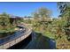 Picturesque pond with bridge offering scenic views of the community at 306 Fincastle Dr, Cary, NC 27513