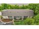 Well-maintained apartments with balconies overlook landscaped grounds and convenient parking spaces at 3077 Huntleigh Dr, Raleigh, NC 27604