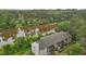 Waterfront condo offers scenic views, nestled among lush trees, providing tranquil lakeside living at 3077 Huntleigh Dr, Raleigh, NC 27604