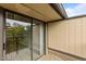 Balcony with sliding glass doors and wood floors at 3077 Huntleigh Dr, Raleigh, NC 27604