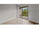 Balcony access from the living space, offering an outdoor area with natural light at 3077 Huntleigh Dr, Raleigh, NC 27604