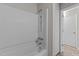 Standard shower and tub combination with a white surround, offering a simple and clean bathing space at 3077 Huntleigh Dr, Raleigh, NC 27604