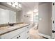 Bright bathroom with granite countertop vanity and natural light at 325 Martin Luther King Jr Blvd, Raleigh, NC 27601