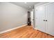 Bright bedroom with hardwood floors features a closet and a rowing machine at 325 Martin Luther King Jr Blvd, Raleigh, NC 27601