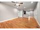 Open space with hardwood floors and a view into the kitchen at 325 Martin Luther King Jr Blvd, Raleigh, NC 27601