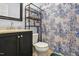 Bathroom featuring a vanity with a dark wood cabinet, toilet, and shower with patterned curtain at 364 Chinaberry Ln, Angier, NC 27501