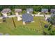 Aerial view of a home with a screened porch and large landscaped yard at 367 Tayside St, Clayton, NC 27520