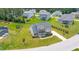 Gathering home with landscaped yard, mature trees, and a trampoline in a friendly neighborhood at 367 Tayside St, Clayton, NC 27520