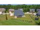 Aerial view of large backyard with screened porch, perfect for outdoor entertaining at 367 Tayside St, Clayton, NC 27520