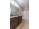 Bathroom featuring double sink vanity with granite countertop, a toilet, and a shower at 367 Tayside St, Clayton, NC 27520