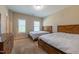 Bedroom featuring two beds with matching wood headboards and a dresser, offering a comfortable space at 367 Tayside St, Clayton, NC 27520