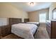 Comfortable bedroom with two matching beds, a window and a dresser at 367 Tayside St, Clayton, NC 27520