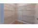 Walk in closet with installed wire shelving and carpeted floors at 367 Tayside St, Clayton, NC 27520