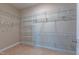 This closet has wall to wall white wire shelving, for optimal storage with neutral carpet at 367 Tayside St, Clayton, NC 27520