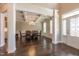 Formal dining room with hardwood floors, coffered ceiling, and large windows at 367 Tayside St, Clayton, NC 27520