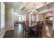 Elegant dining room with hardwood floors, coffered ceiling, and open layout at 367 Tayside St, Clayton, NC 27520