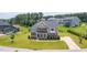 Desirable brick home boasting a neatly landscaped lawn and classic architectural details at 367 Tayside St, Clayton, NC 27520