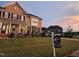 Beautiful brick home with lush green lawn and manicured landscaping at 367 Tayside St, Clayton, NC 27520