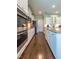 Gourmet kitchen with stainless steel appliances and hardwood floors at 367 Tayside St, Clayton, NC 27520