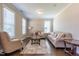 Bright, airy living room with elegant furnishings and hardwood floors at 367 Tayside St, Clayton, NC 27520